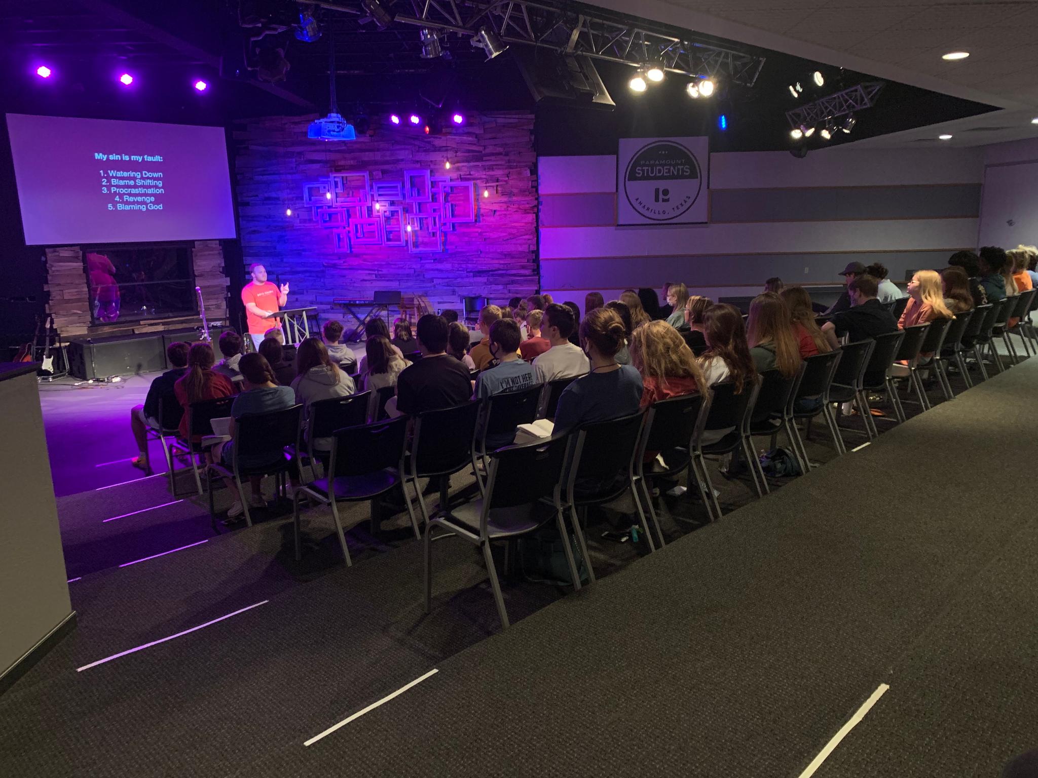 Youth Pastor Will Standridge ministering to young people