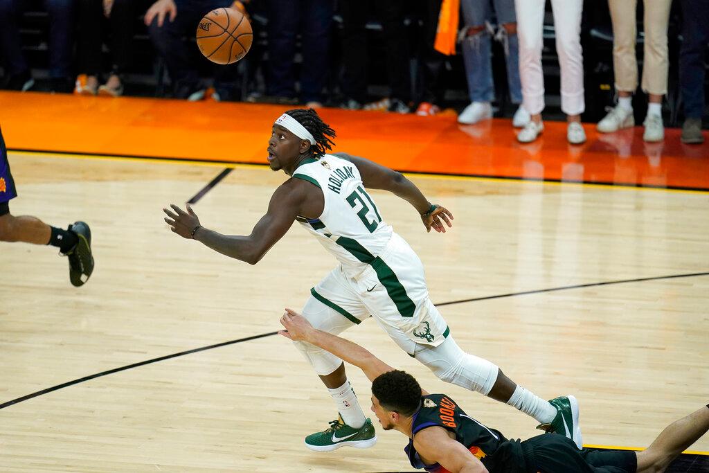 Bucks Jrue Holiday and Suns Devin Booker