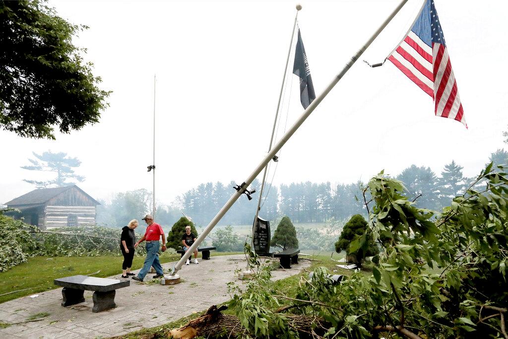 Jefferson County residents inspect damage at Dahnert Park, Thursday, July 29, 2021 in Concord, Wis., following an overnight storm.