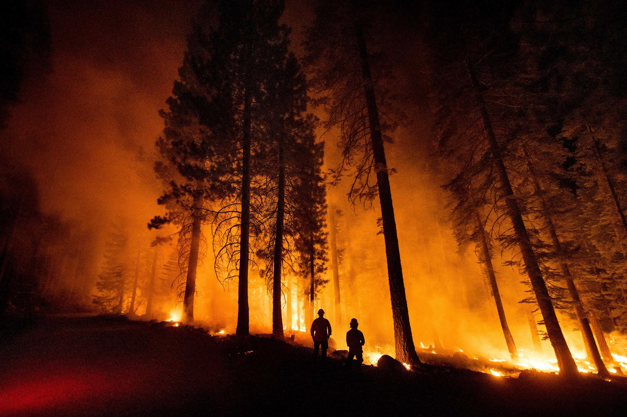 crews set a ground fire to stop a wildfire from spreading
