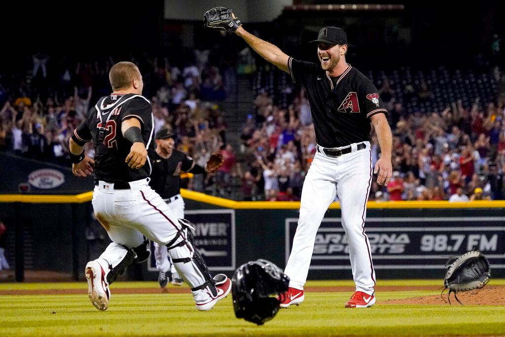 AZ D-backs starting pitcher Tyler Gilbert celebrates after his no-hitter 