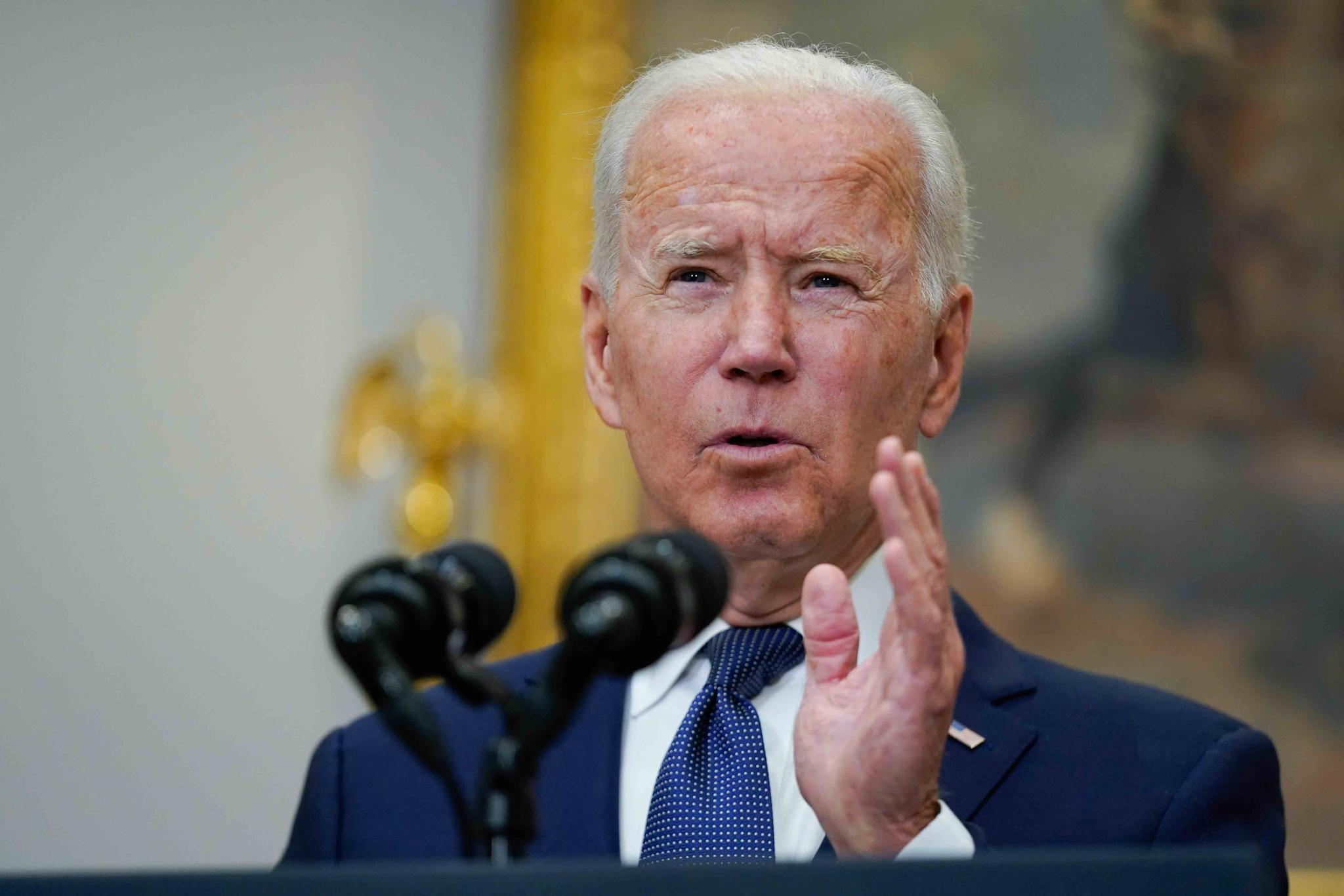 President Joe Biden speaks about Hurricane Henri and Afghanistan evacuations in the Roosevelt Room of the White House, Sunday, Aug. 22, 2021, in Washington.