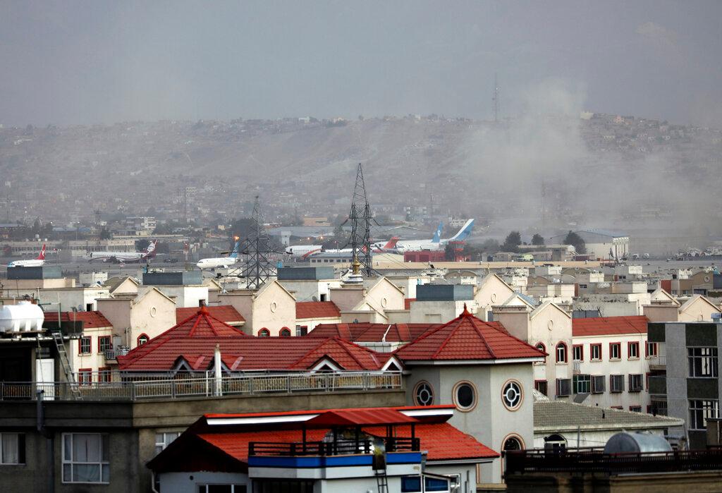 Smoke rises from explosion outside airport in Kabul, Afghanistan