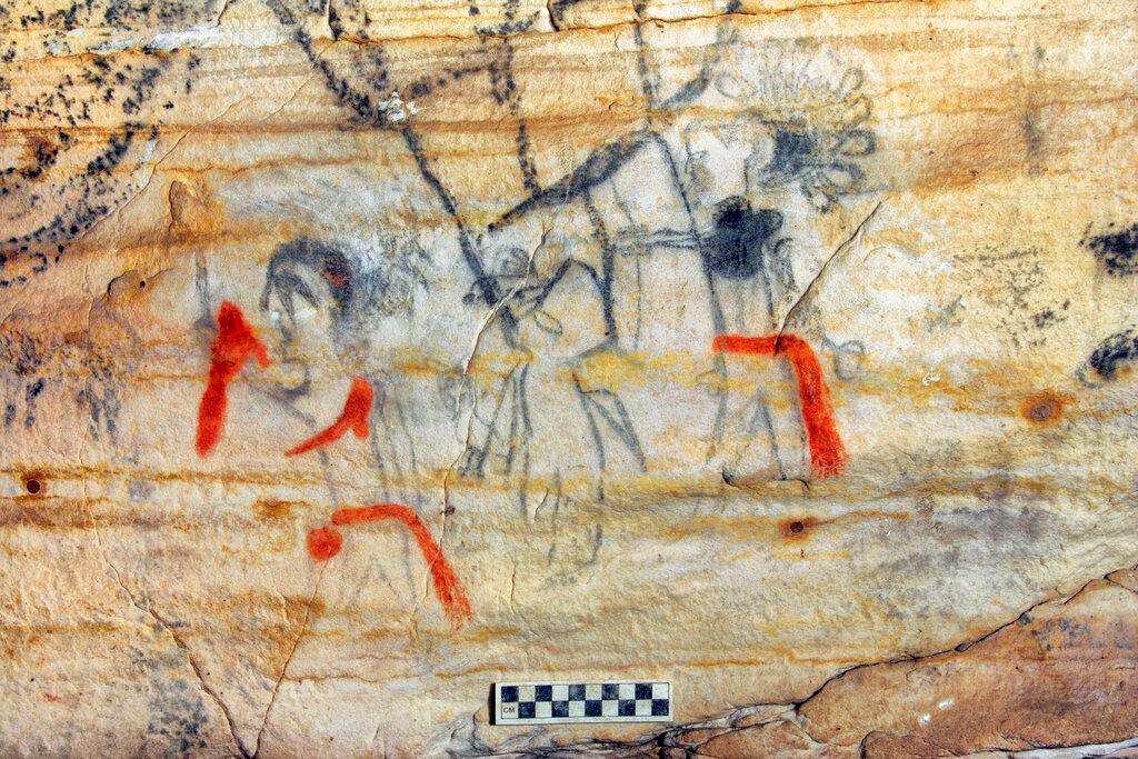 The art inside "Picture Cave" shows humans, animals and mythical creatures