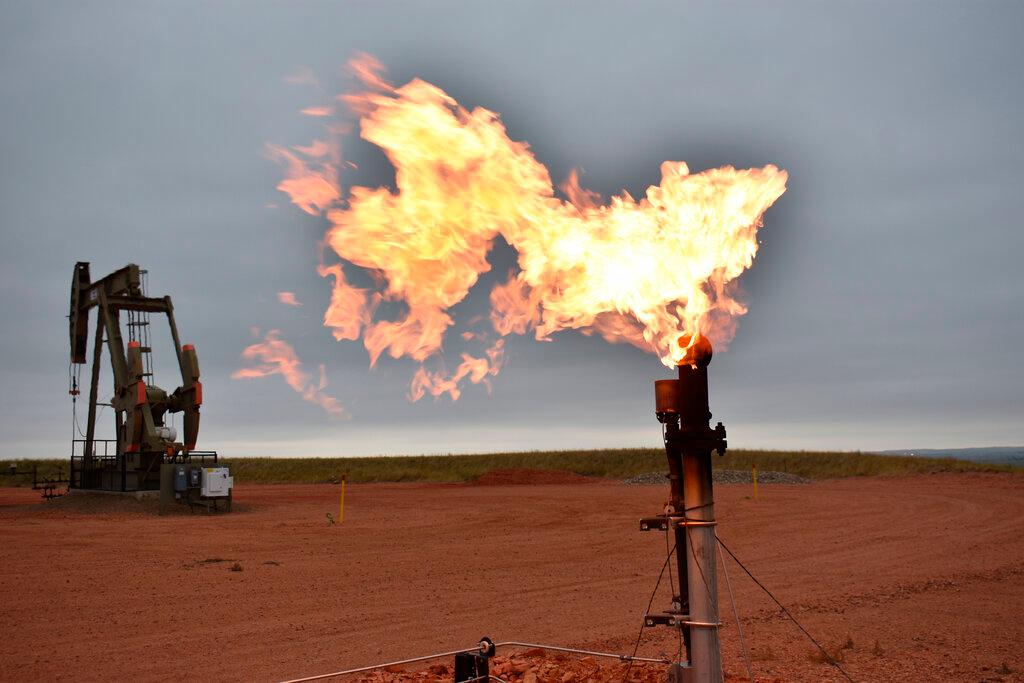 Natural gas flare burn in oil field 