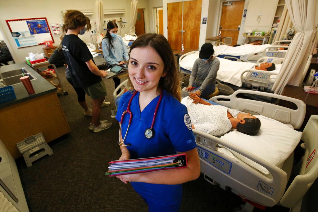 First year nursing student, Emma Champlin, in her clinical laboratory class at Fresno State