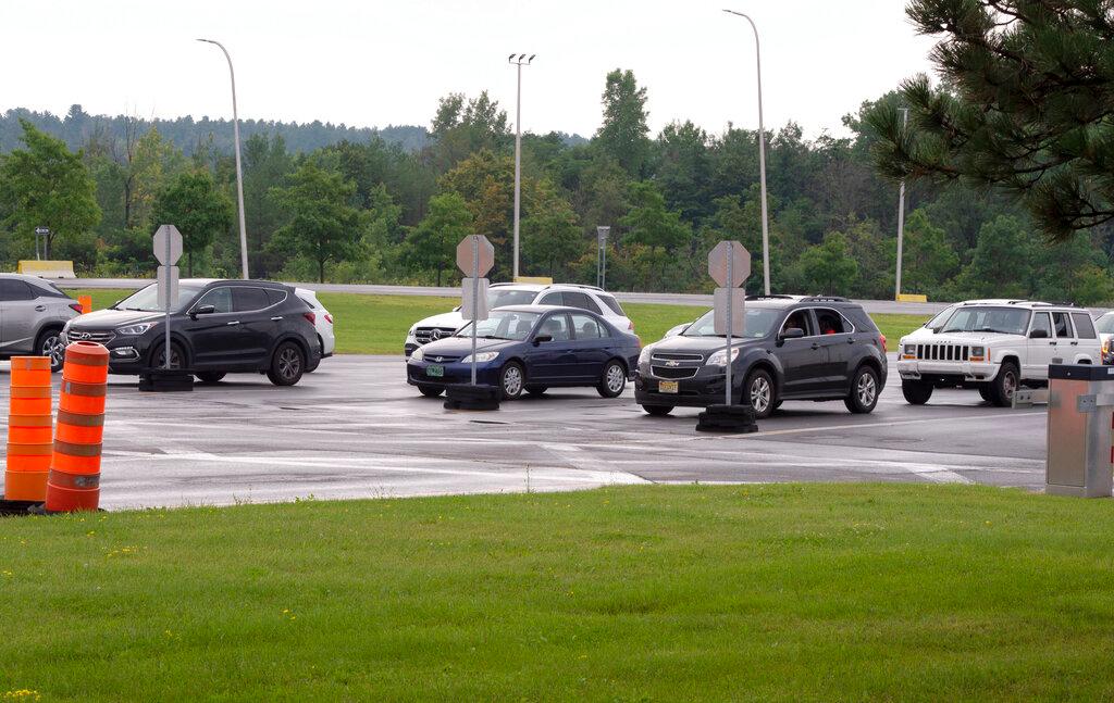 cars line up at the border crossing at Lacolle, Quebec, Canada, south of Montreal 