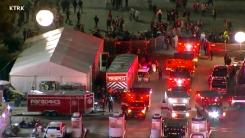 Emergency personnel respond to the Astroworld music festival in Houston on Friday, Nov. 5, 2021. Several people died and numerous others were injured in what officials described as a surge of the crowd at the music festival while Travis Scott was performing. Officials declared a “mass casualty incident” just after 9 p.m. Friday during the festival where an estimated 50,000 people were in attendance, Houston Fire Chief Samuel Peña told reporters at a news conference