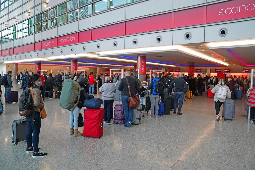Passengers waiting at London's Heathrow Airport 