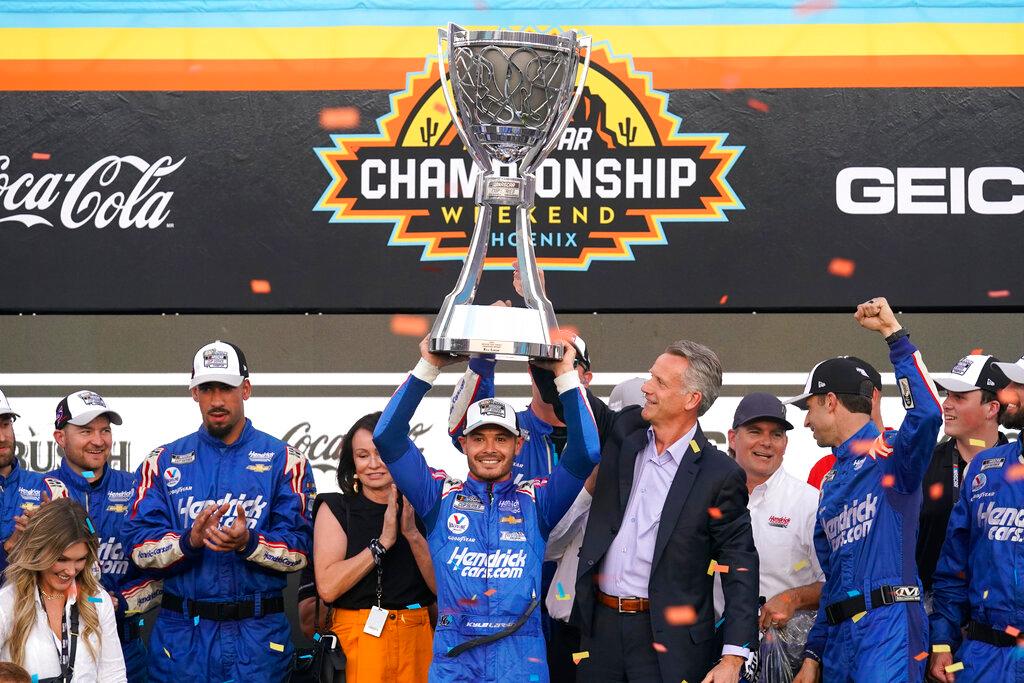 Kyle Larson celebrates with his team after winning NASCAR Cup Series race 