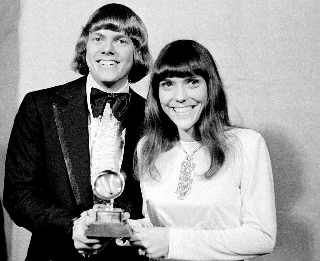 Richard and Karen Carpenters of The Carpenters pose with their Grammy during the 13th annual 1970 Grammy Awards