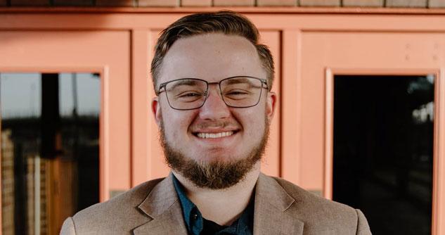 Smiling man with glasses