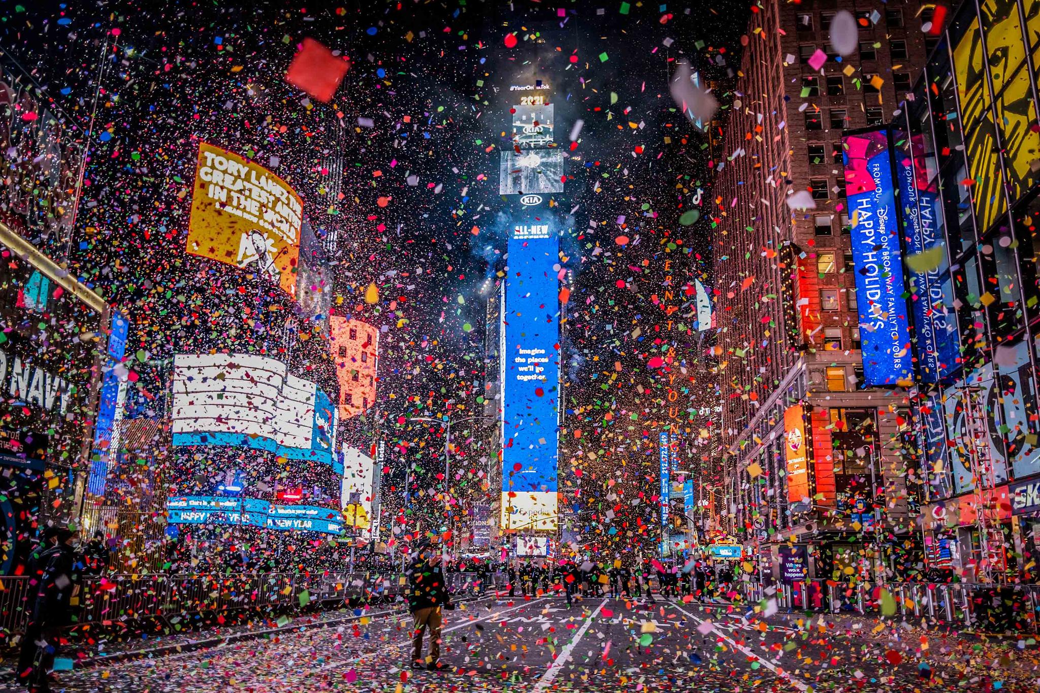 Confetti flies after the Times Square New Year's Eve Ball drops in a nearly empty Times Square due to COVID-19 lockdown, early Friday, Jan. 1, 2021.