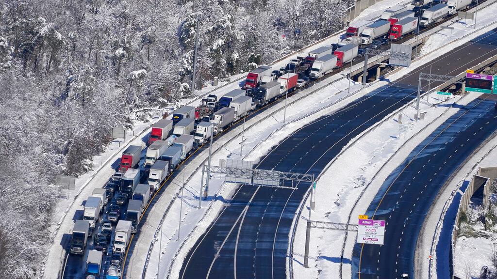 Cars and trucks are stranded on sections of Interstate 95 Tuesday 
