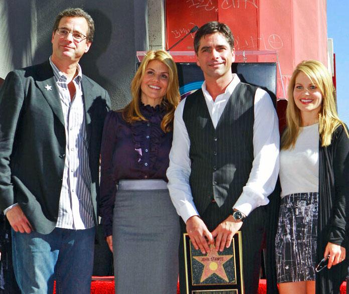 Actor John Stamos, second right, is joined by former cast members from the family comedy series, "Full House," Bob Saget, left, Lori Laughlin, second left, and Candace Cameron Bure as Stamos is honored with star on the Hollywood Walk of Fame Monday, Nov. 16, 2009, in Los Angeles
