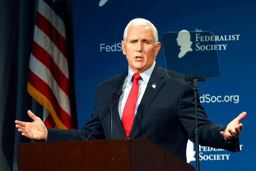 Former Vice President Mike Pence speaks at the Florida chapter of the Federalist Society's annual meeting at Disney's Yacht Club resort in Walt Disney World 