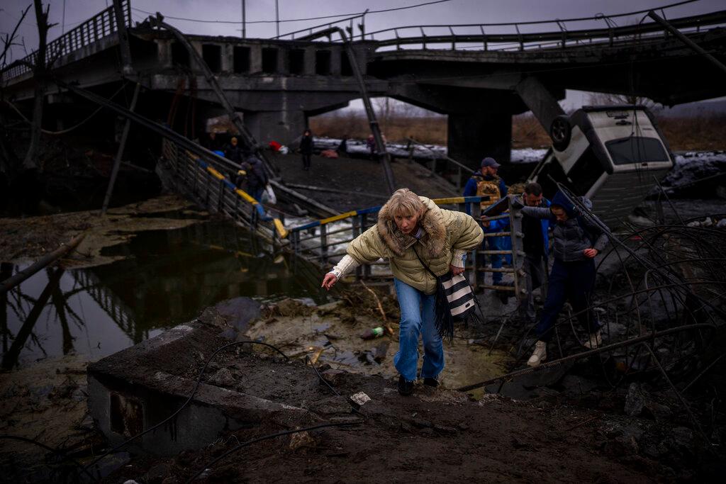 Woman flees from Kyiv Ukraine 