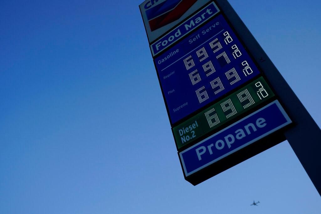 Gas prices are advertised at nearly $7 a gallon in Los Angeles