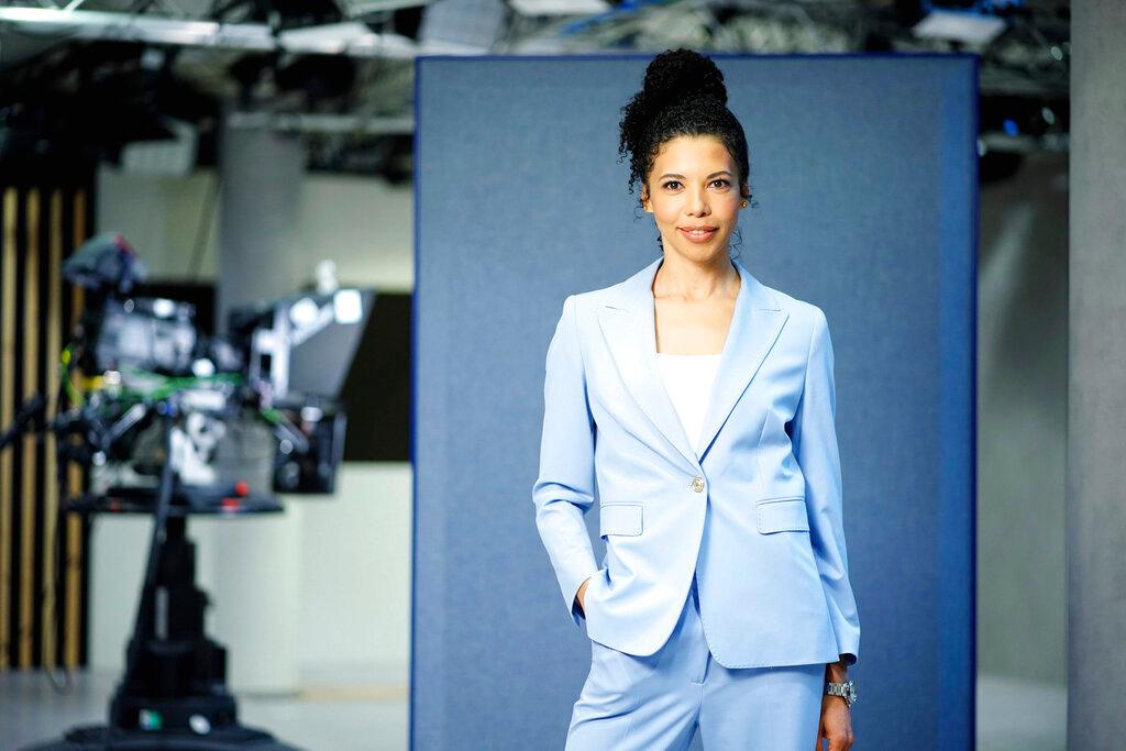 Ukrainian anchor Karolina Ashion, who evacuated, shown in the RTL TV studio in Cologne, Germany - she will host a daily news show for others who have fled their homeland