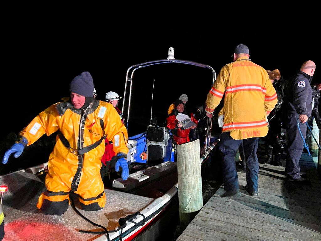 Rescue workers at site of Navy plane crash 