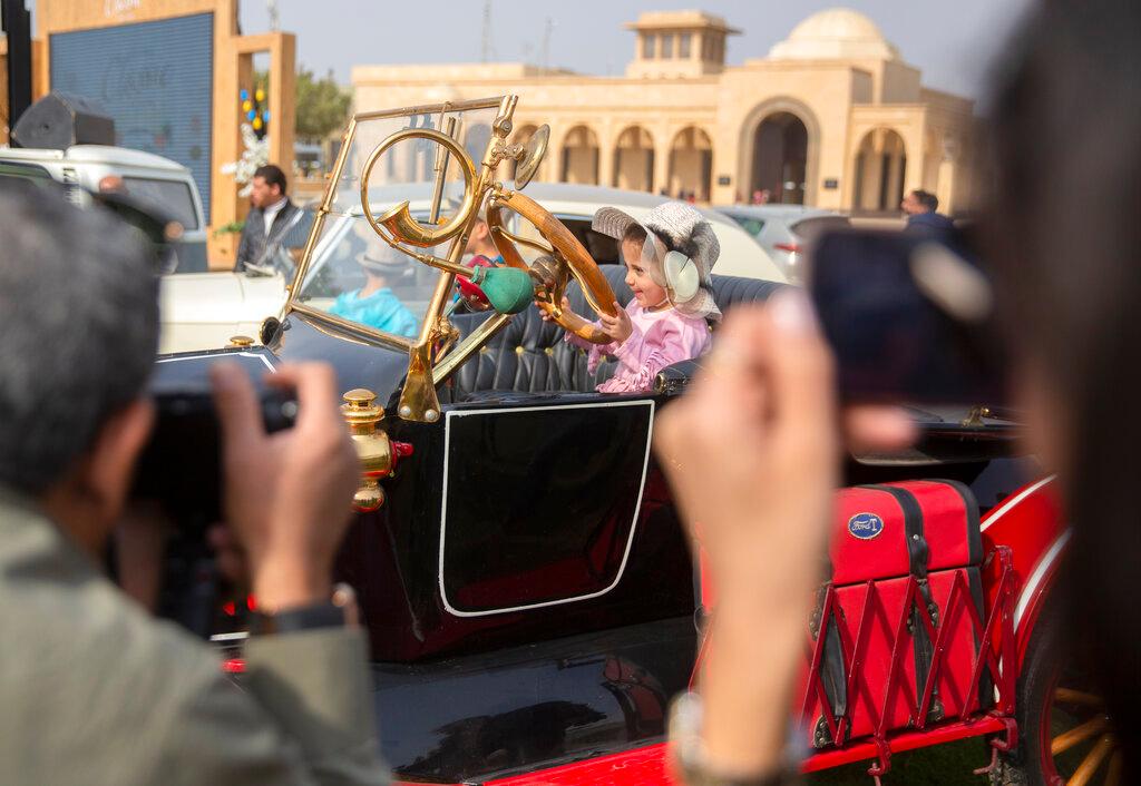 5-year-old sits for a photo in a 1924 Ford Model T 