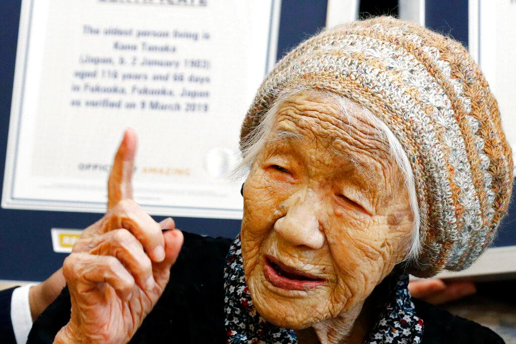 ane Tanaka, then 116-years-old, reacts after receiving a Guinness World Records certificate