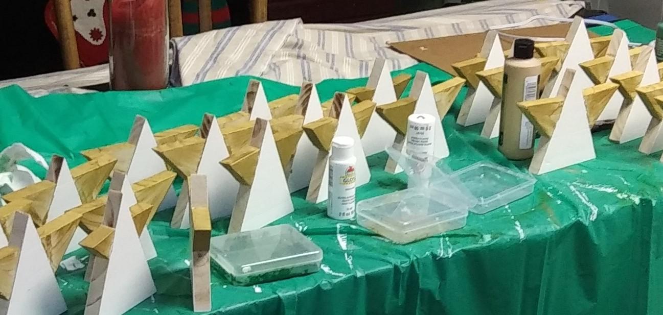 Wooden angels being made and painted