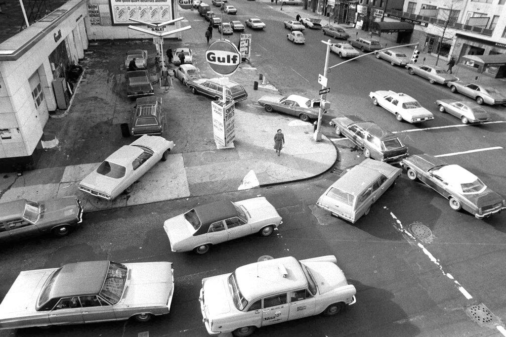 Cars line up in two directions at a gas station in New York City, on Dec. 23, 1973