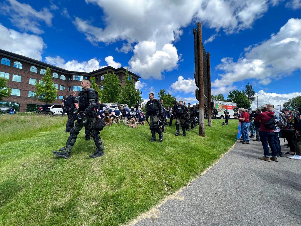 Authorities arrest members of the white supremacist group Patriot Front near an Idaho pride event Saturday, June 11, 2022, after they were found packed into the back of a U-Haul truck with riot gear.