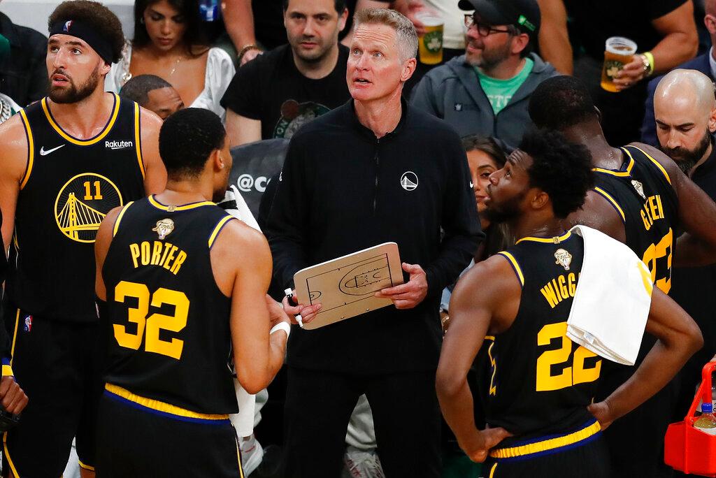 players and coach during time out at game