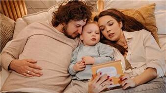 parents reading bedtime story