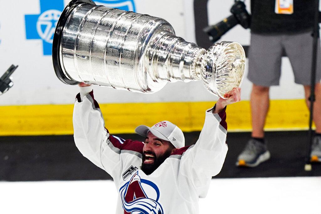 Colorado Avalanche center Nazem Kadri lifts the Stanley Cup after the team defeated the Tampa Bay Lightning 2-1 in Game 6 of the NHL hockey Stanley Cup Finals
