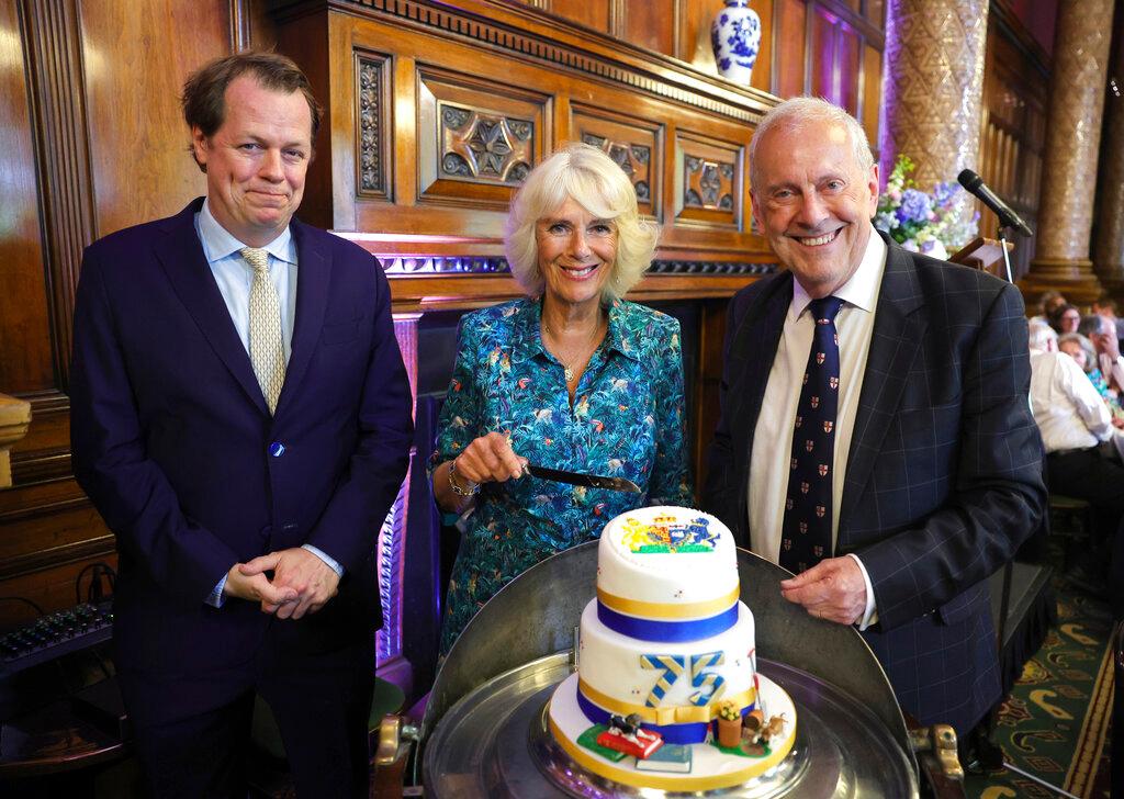 3 people and birthday cake 