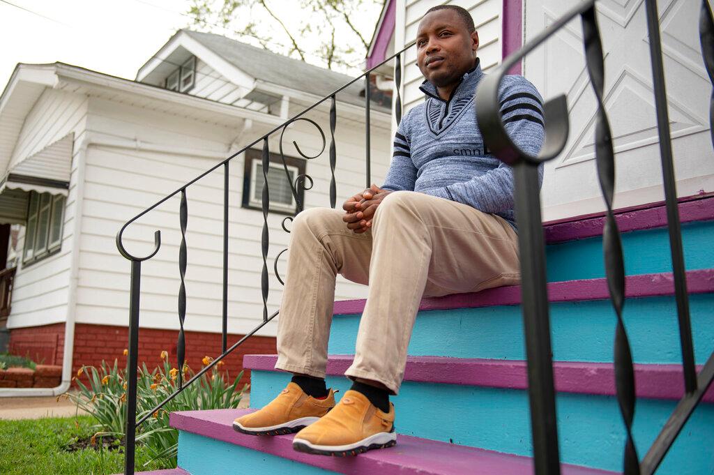 Victor Harerimana poses for a photograph in Cleveland on May 4, 2022. Harerimana is a Congolese refugee who used the Microenterprise Development program to launch Equity Languages and Employment Services, a business he co-owns.