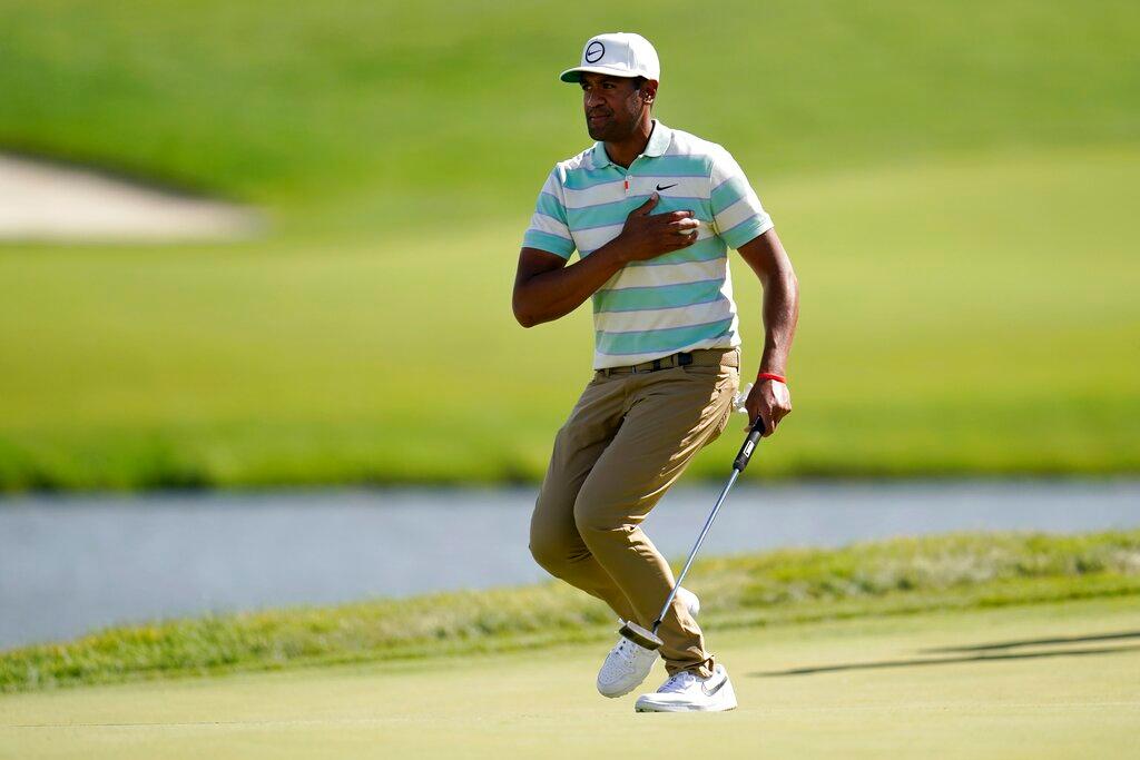 Man on golf course after important shot.