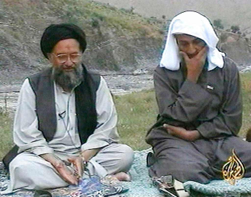 (2002) Osama bin Laden, right, listens as his top deputy Ayman al-Zawahri 