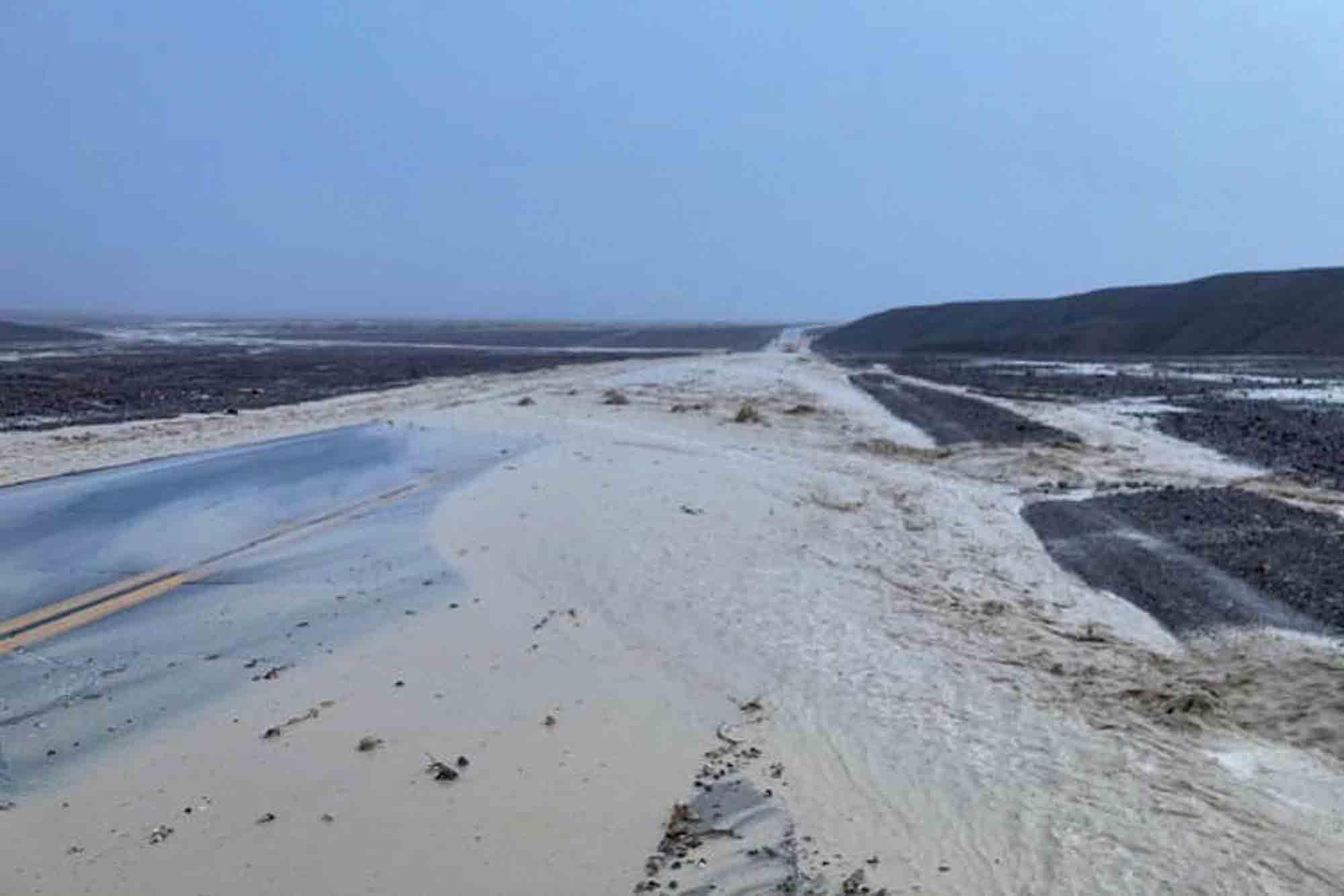 In this photo provided by the National Park Service, Highway 190 is closed due to flash flooding in Death Valley National Park, Calif., Friday, Aug. 5, 2022.