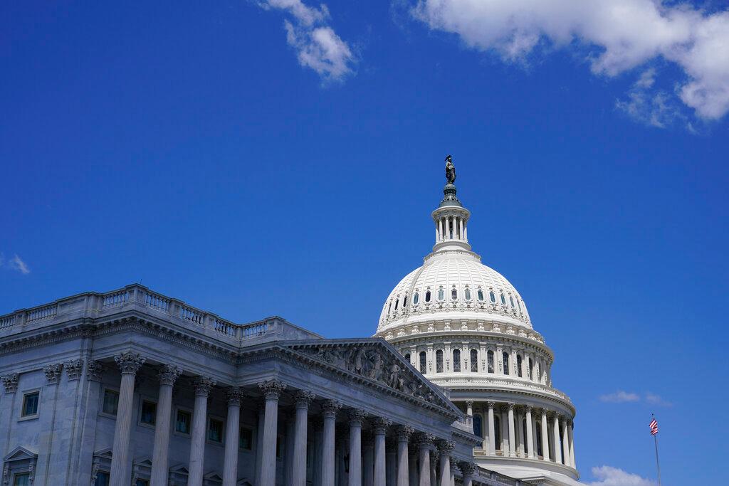 Image of the Capitol dome with blue skies above