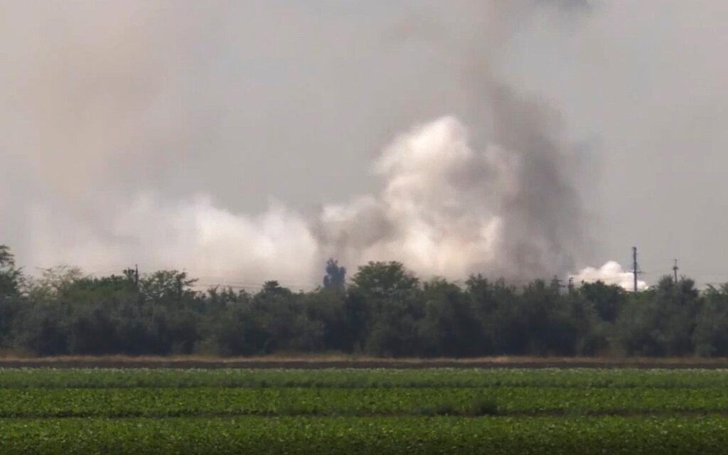 Smoke rises over the site of explosion at an ammunition storage of Russian army near the village of Mayskoye, Crimea