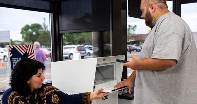 Woman taking a ballot