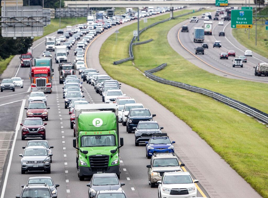 Traffic builds along Interstate 4 as people evacuated Tampa area