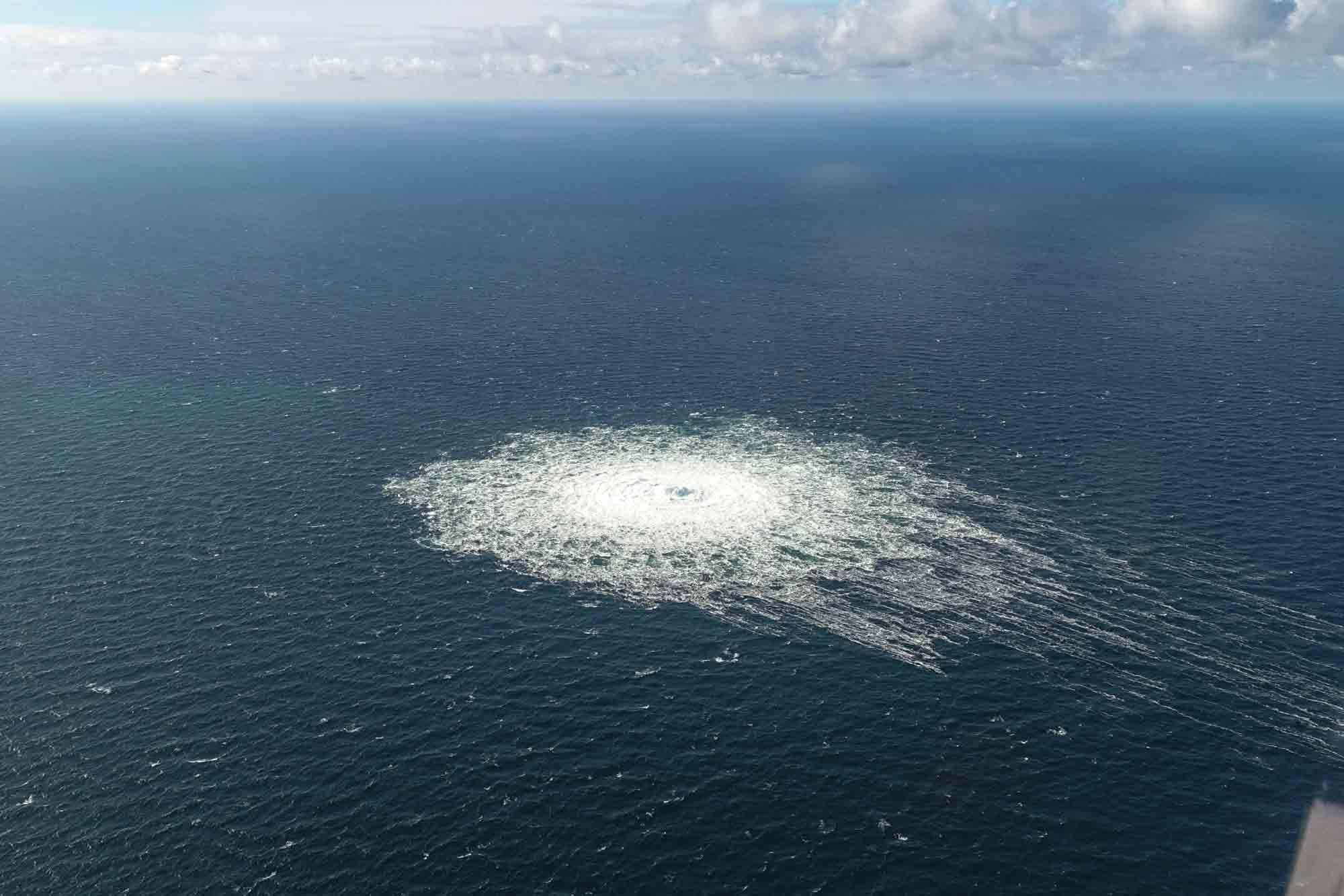 A large disturbance in the sea can be observed off the coast of the Danish island of Bornholm Tuesday, Sept. 27, 2022 following a series of unusual leaks on two natural gas pipelines running from Russia under the Baltic Sea to Germany have triggered concerns about possible sabotage.