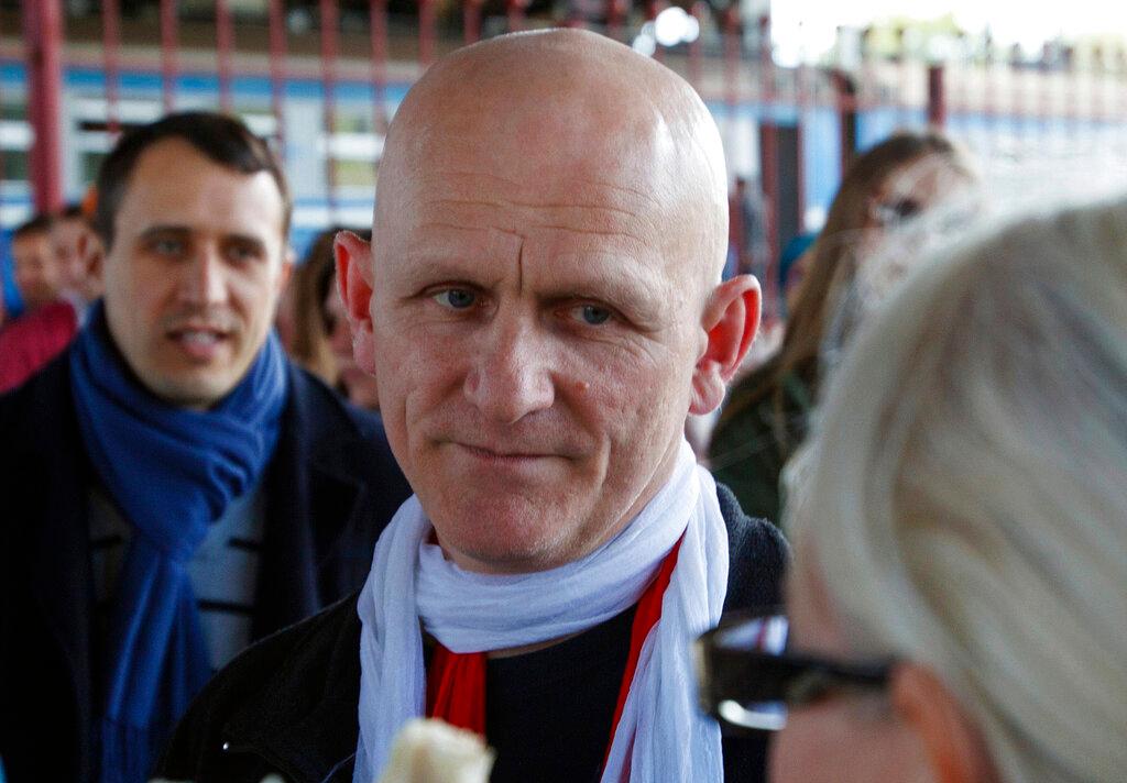 (Now in prison) Belarusian human rights advocate Ales Bialiatski is welcomed by his supporters at a railway terminal in Minsk, Belarus (2014)