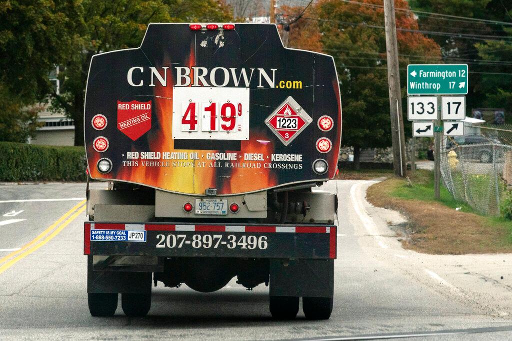 A fuel delivery truck advertises its price for a gallon of heating oil