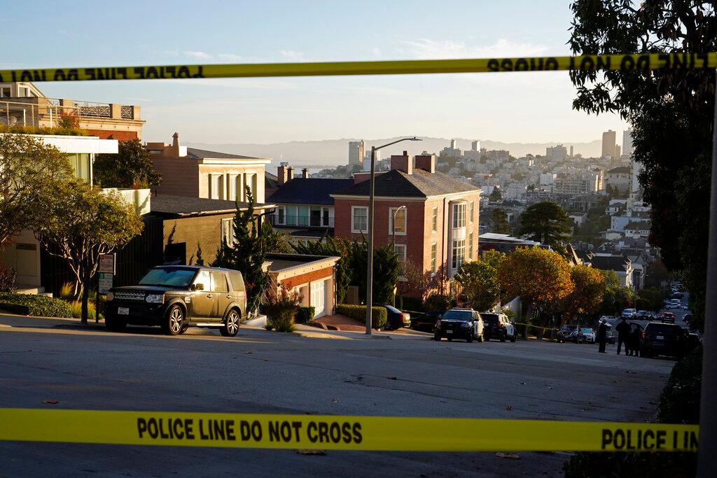Police tape blocks a street outside the home of Paul Pelosi, the husband of House Speaker Nancy Pelosi, in San Francisco