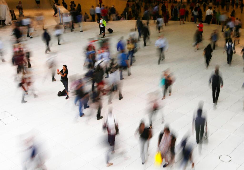 blurred people walking 