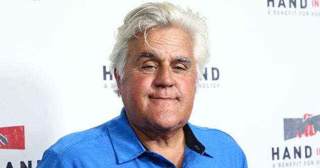 Jay Leno in blue shirt against white background
