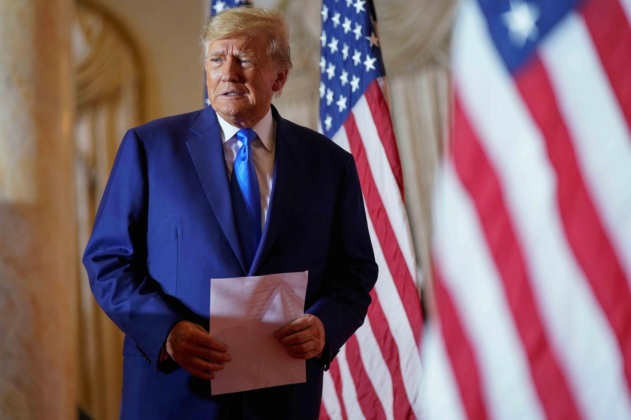 Former President Donald Trump arrives to speak at Mar-a-lago on Election Day, Nov. 8, 2022, in Palm Beach, Fla. Trump is preparing to launch his third campaign for the White House with an announcement Tuesday night, Nov. 15.