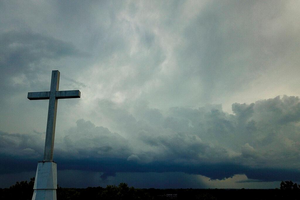 Storm clouds approach a church in Mequon, Wis