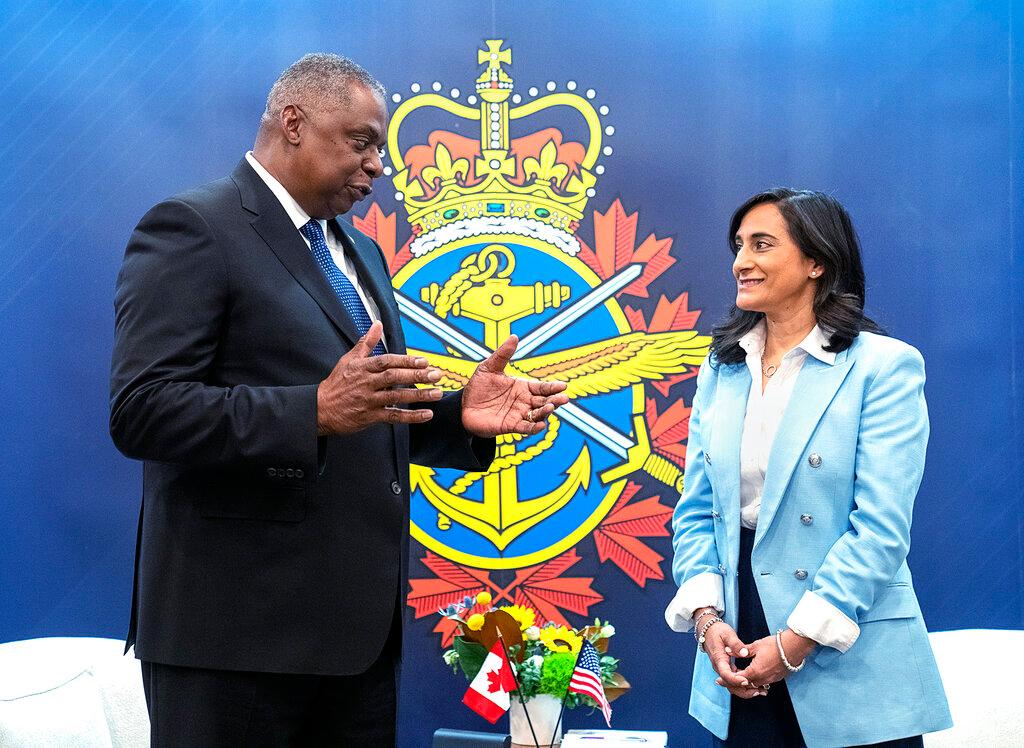 Canadian Defence Minister Anita Anand, right, and U.S. Secretary of Defense Lloyd J. Austin III hold a bilateral meeting at the Halifax International Security Forum 